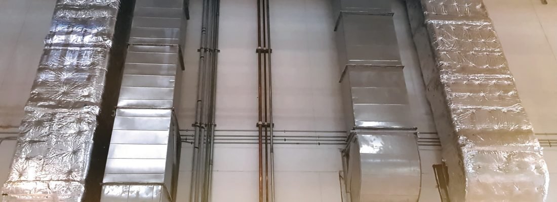 Low Angle View of Air Ducts and Piping of Air Conditioning System